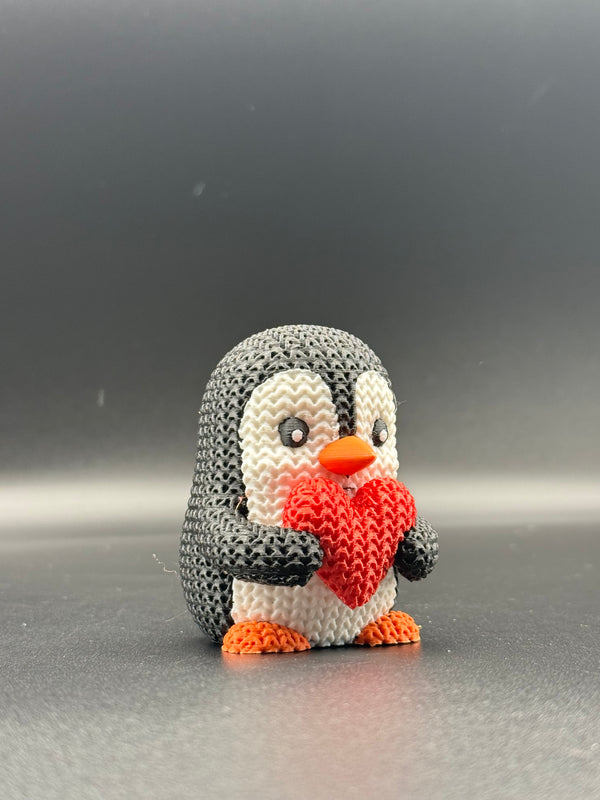 Knitted Penguin Holding a heart